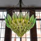 Exhale: Living chandelier filled with algae purifies air around it