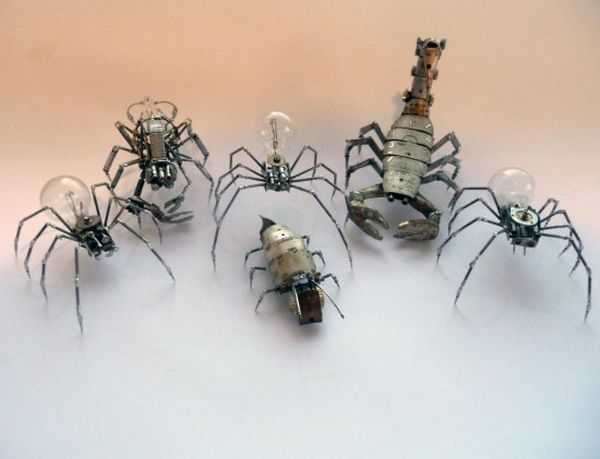 Mechanical insects made from recycled watch parts and light bulbs