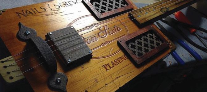 Rustic chic DIY cigar box guitar produces smoky sound